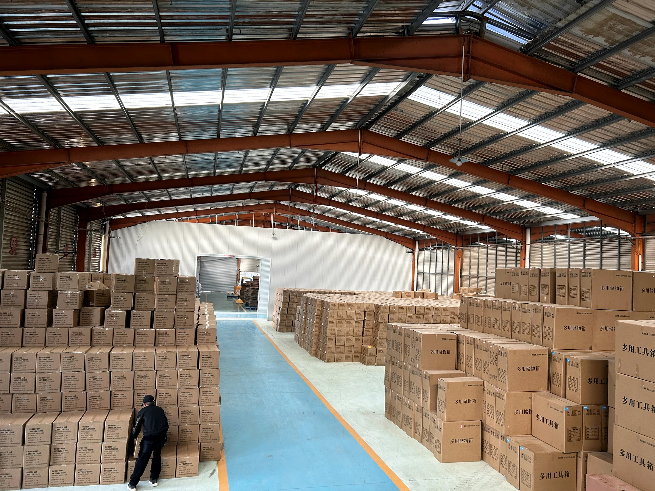 Finished goods organized for shipment in the factory warehouse